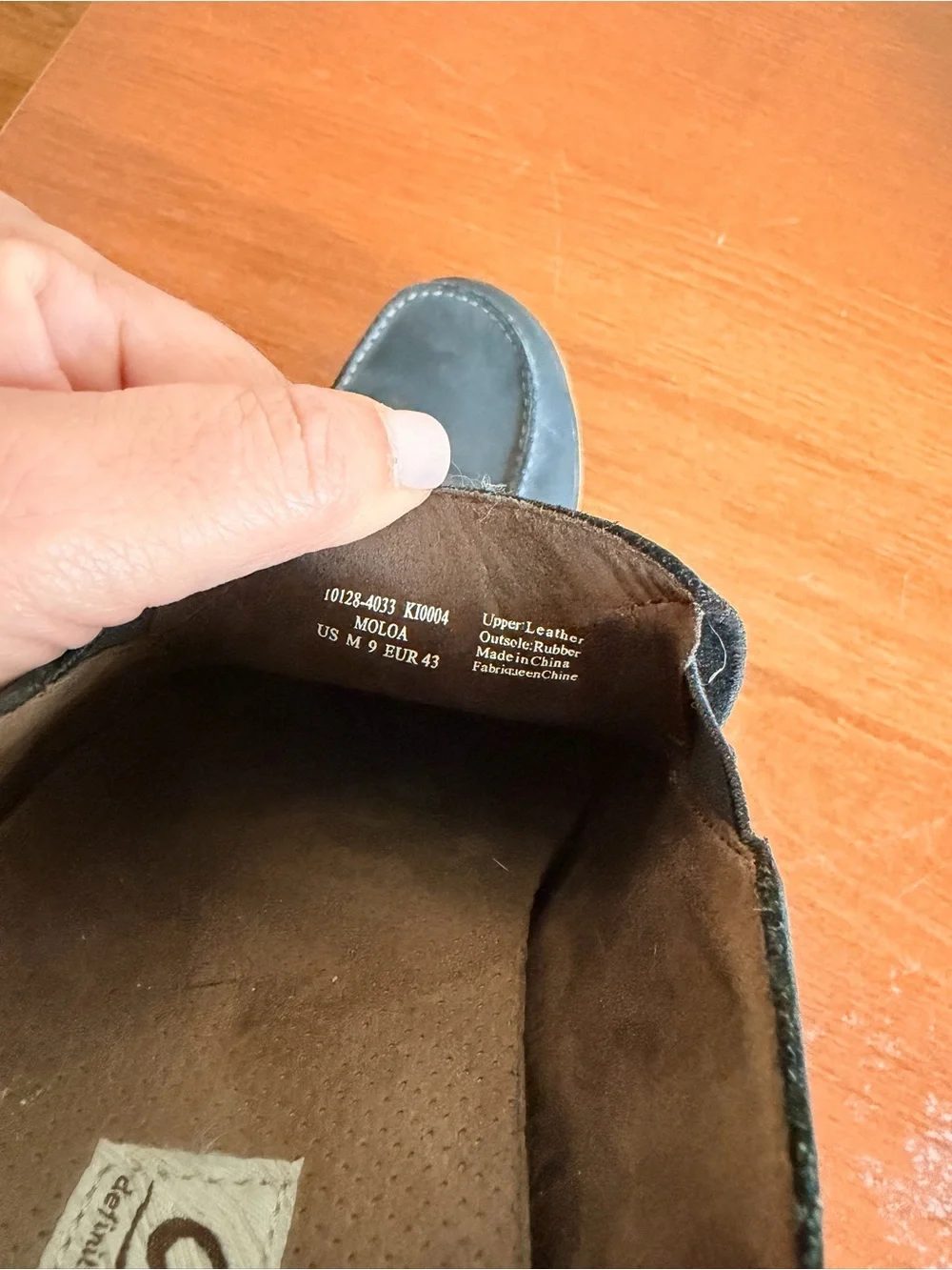 OluKai black leather